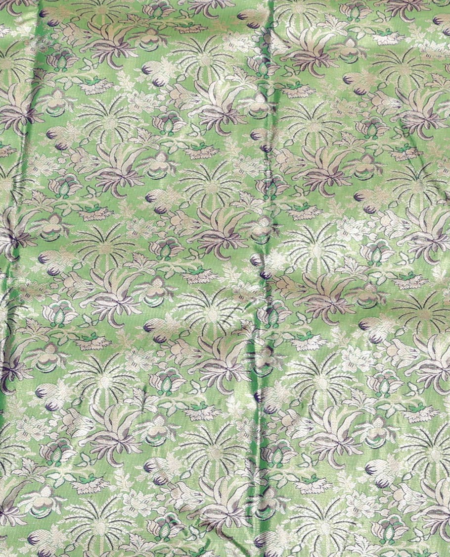 Green Art Silk Half-Saree, Spotlighted with Jacquard Design, Contrast Traditional Zari Border, Paired with a Contrast Jacquard Blouse, and an Intricate Dhavani