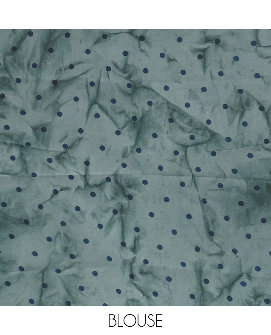 Green tamil letters printed soft cotton saree, zari piping border, small polka dotted pallu, and blouse of abstract and polka dots print