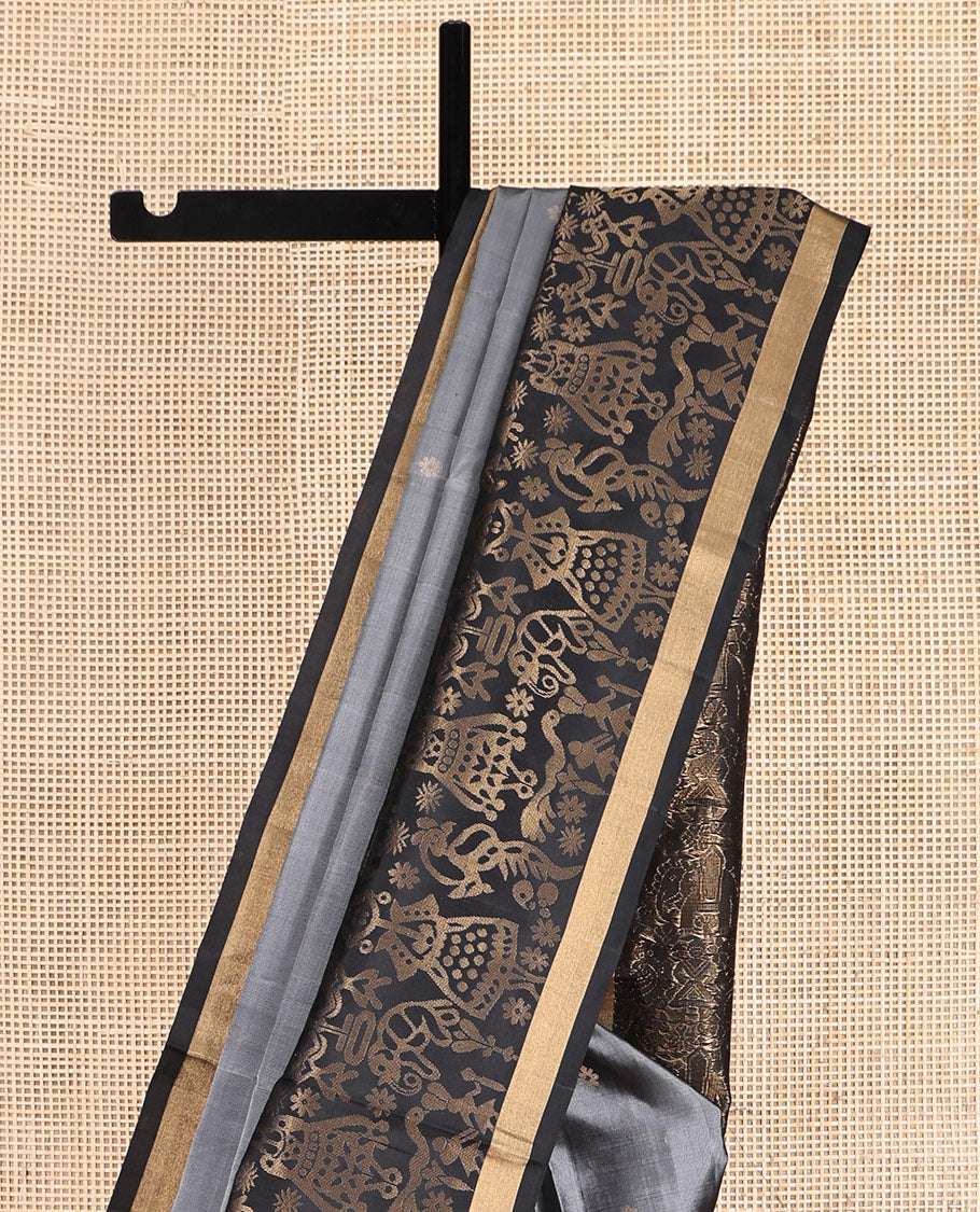 Grey Mayuri Soft Silk Saree, Subtly Sparkled with Zari Buttas, a Contrast Tribal-Themed Woven Border, Pallu of Forest-Themed Designs, and Contrast Blouse