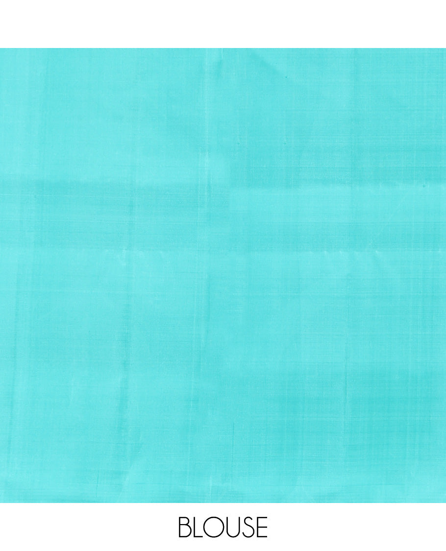 Borderless Blue Mayuri Soft Silk Saree, Subtly Woven with Buttas All Over Its Body, Highlighted by Pallu of Sparsely Woven Designs, and Paired with a Matching Blouse