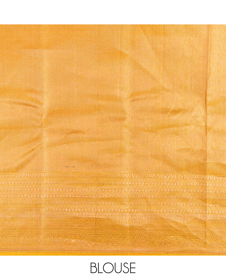 Yellow Kanchipuram Silk Saree, Subtly Sparkled with Zari Buttas All Over Its Body, Highlighted by a Zari Traditional Design Border, Grand Pallu, and Paired with a Matching Blouse