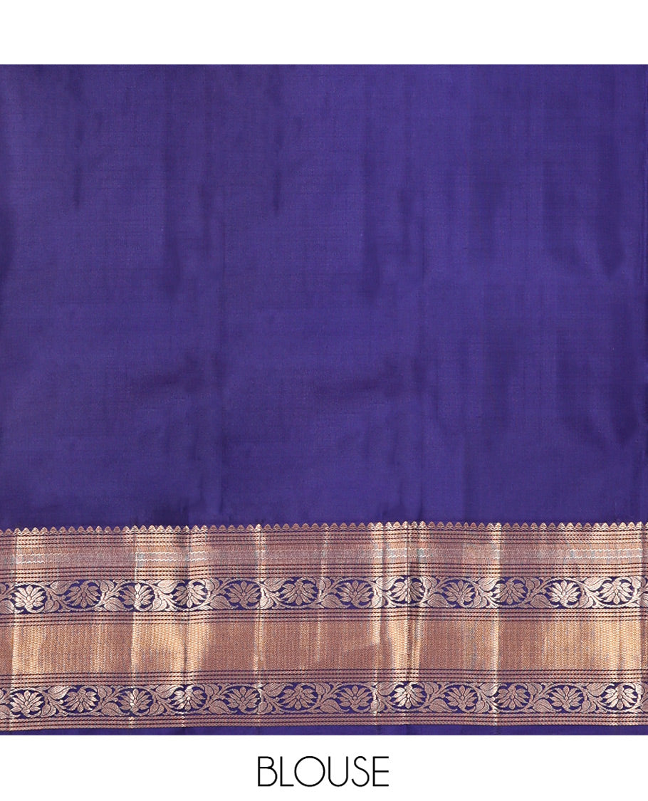 Sandal Vasundhara Silk Saree, Sparsely Sparkled with Zari Buttas, Complemented by a Contrast Border of Thilakam Mokku, Kodi Visiry, and Mayil Kann Designs, Jaal Pallu, and a Contrast Blouse