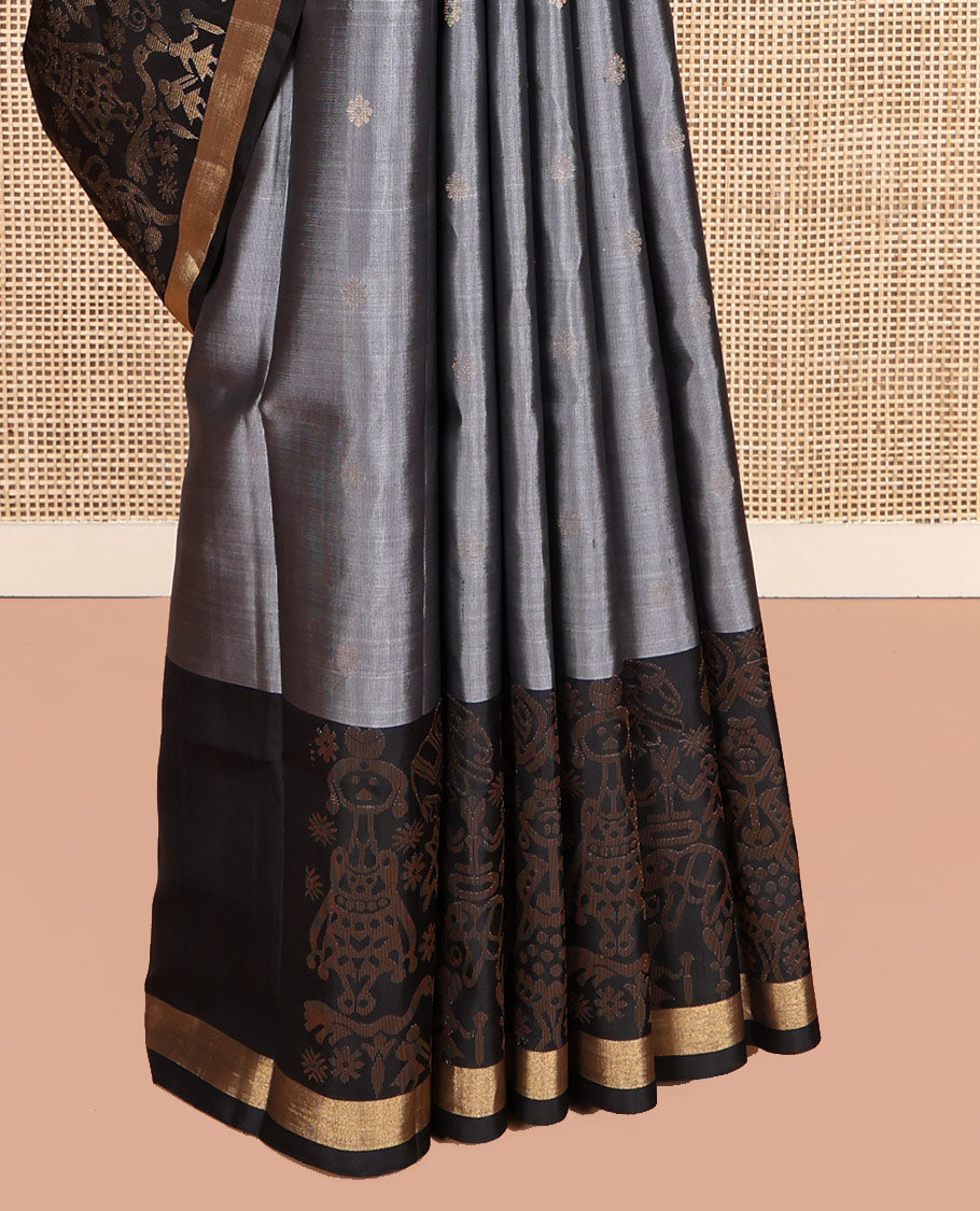 Grey Mayuri Soft Silk Saree, Subtly Sparkled with Zari Buttas, a Contrast Tribal-Themed Woven Border, Pallu of Forest-Themed Designs, and Contrast Blouse