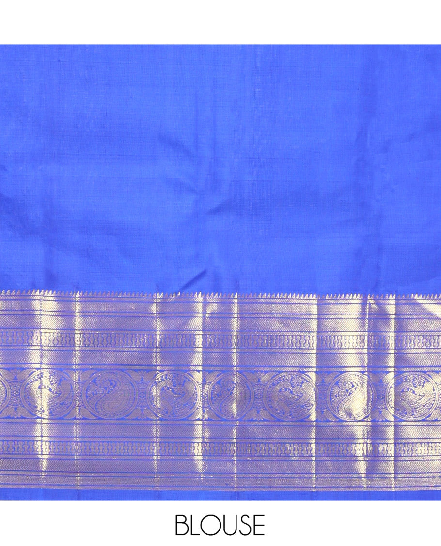 Blue Kanchipuram Silk Saree, Graced with Zari Buttas, Highlighted by Zari Border of Rekku, Vanki, Round Manga, and Round Mayil, Zari Design Pallu, and Matching Blouse