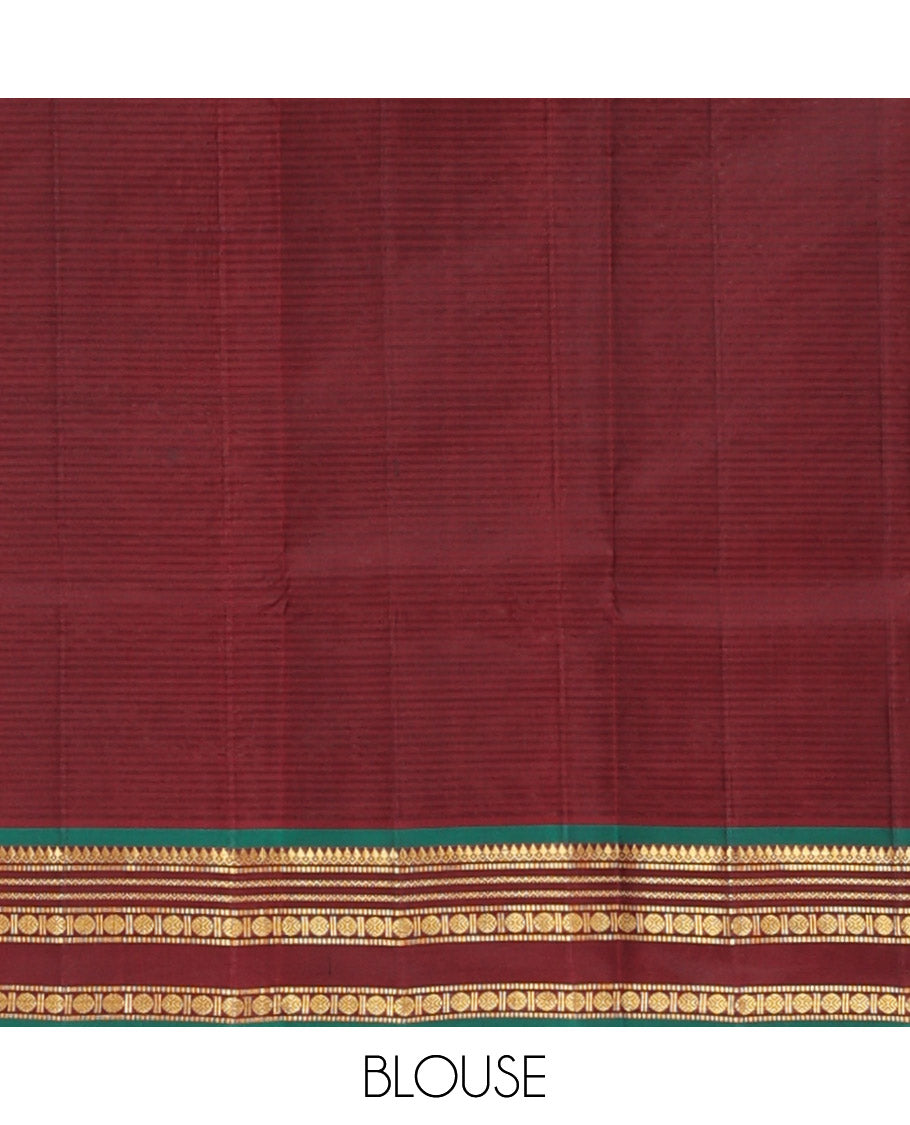 Rosewood Pink Kanchipuram Silk Saree Adorned with Vazhaipoo Stripes and Zari Buttas, Complemented by a Contrast Rettai Pettu Border Featuring Thazampoo Rekku, Muthu, Neli, and Rudraksham Designs, Gleaming Zari Pallu, and Paired with a Contrast Blouse