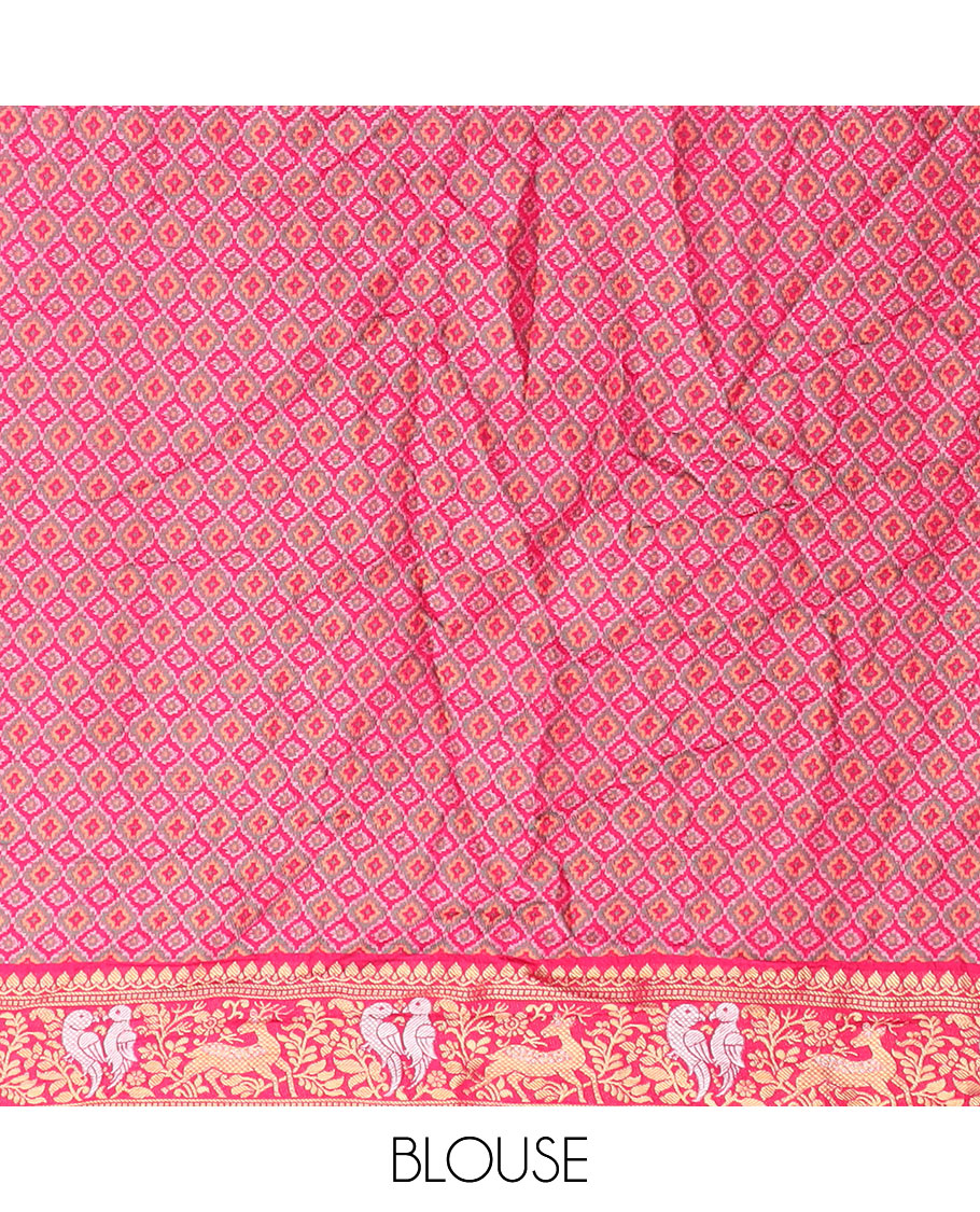 Yellow bandhani dots and zari buttas bandhani silk saree, contrast flora-fauna motifs woven border, and patola elephant enclosed ogee patterns