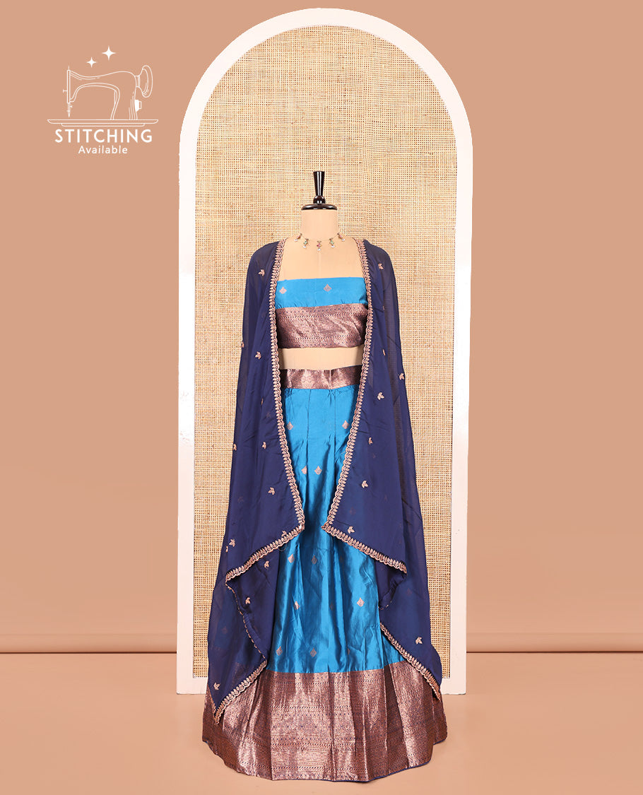 Light Blue and Navy Blue Semi-Banarasi Half-Saree, Spotlighted with Zari Buttas on Its Skirt, Complemented by a Contrast Traditional Zari Designs Woven Border, Paired with a Matching Blouse, and a Contrast Satin Georgette Embroidered Scallop Dhavani