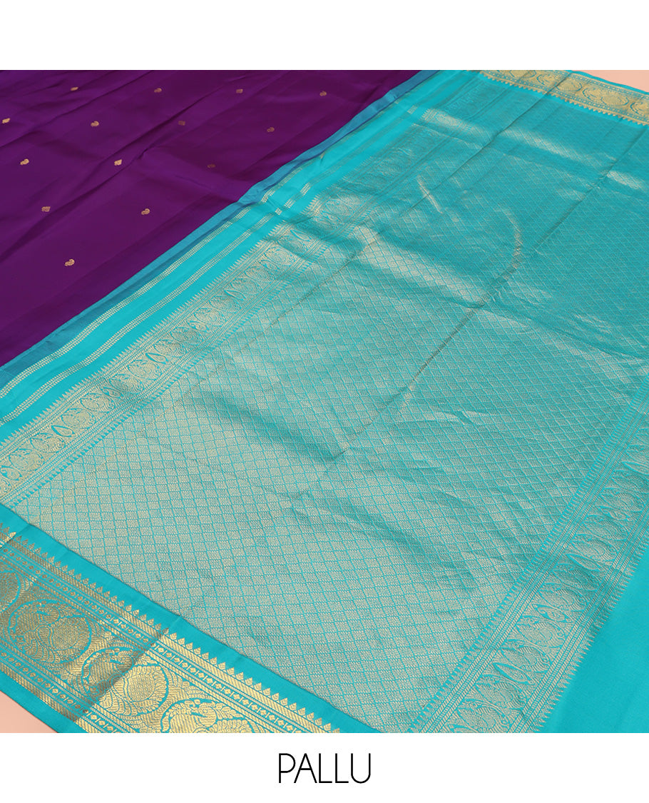 Violet Vasundhara Silk Saree, Subtly Sparkled With Zari Buttas All Over Its Body, Complemented by Zari Buttas All Over Its Body, Complemented by Contrast Border of Thilakam, Banaras, and Mayil Designs Grand Jaal Pallu and Paired with a Contrast Blouse