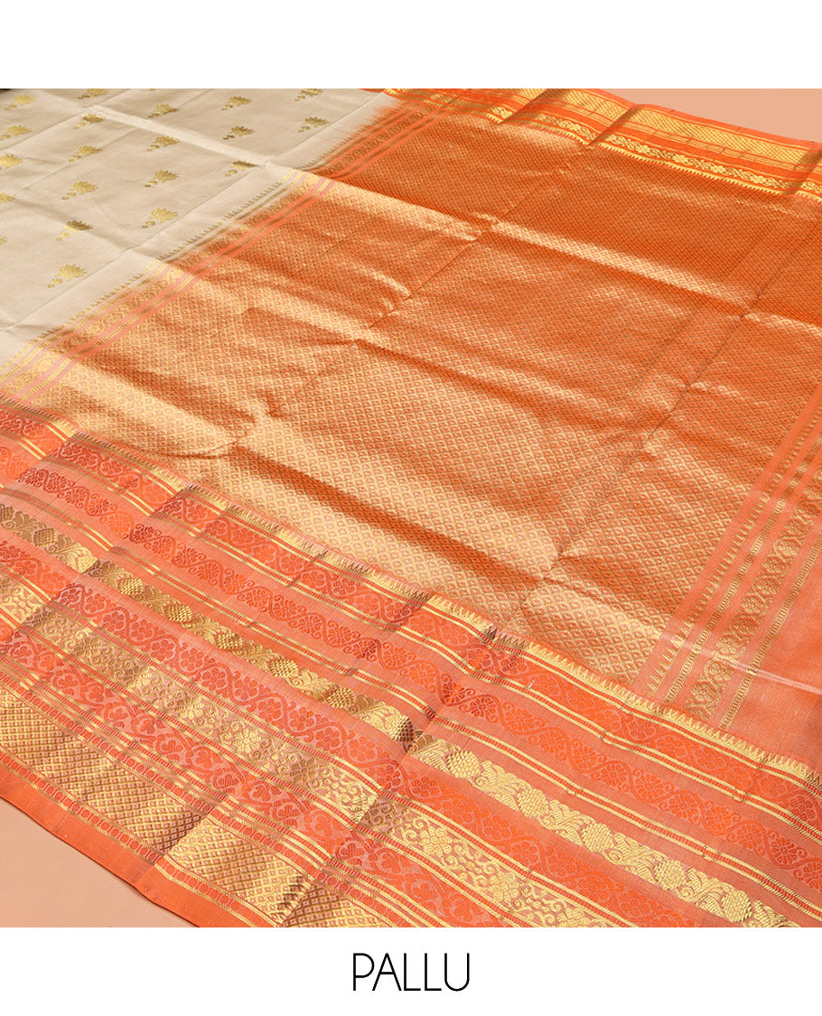 Ivory Venkatagiri Silk Saree, Enthralled with Pichwai Lotus Buttas All Over Its Body, Complemented by a Contrast Traditional Zari Design Border, Pallu of Jaal Designs, and Paired with a Contrast Blouse