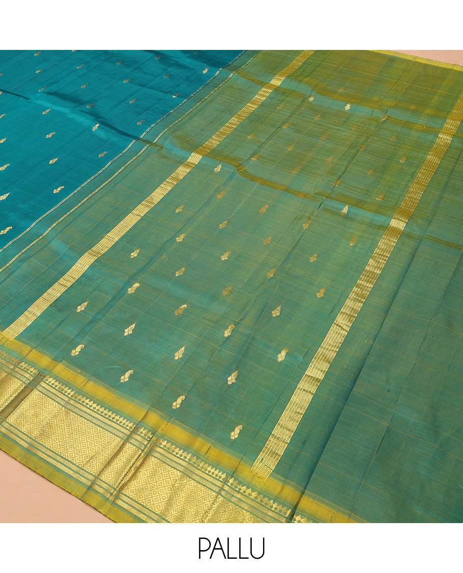 Green Kanchipuram Silk Saree, Adorned with Zari Buttas, Complemented by a Contrast One-Sided Border of Panner Sombu, Banaras, and Mayil Kann Designs, Zari Woven Pallu, and a No Blouse