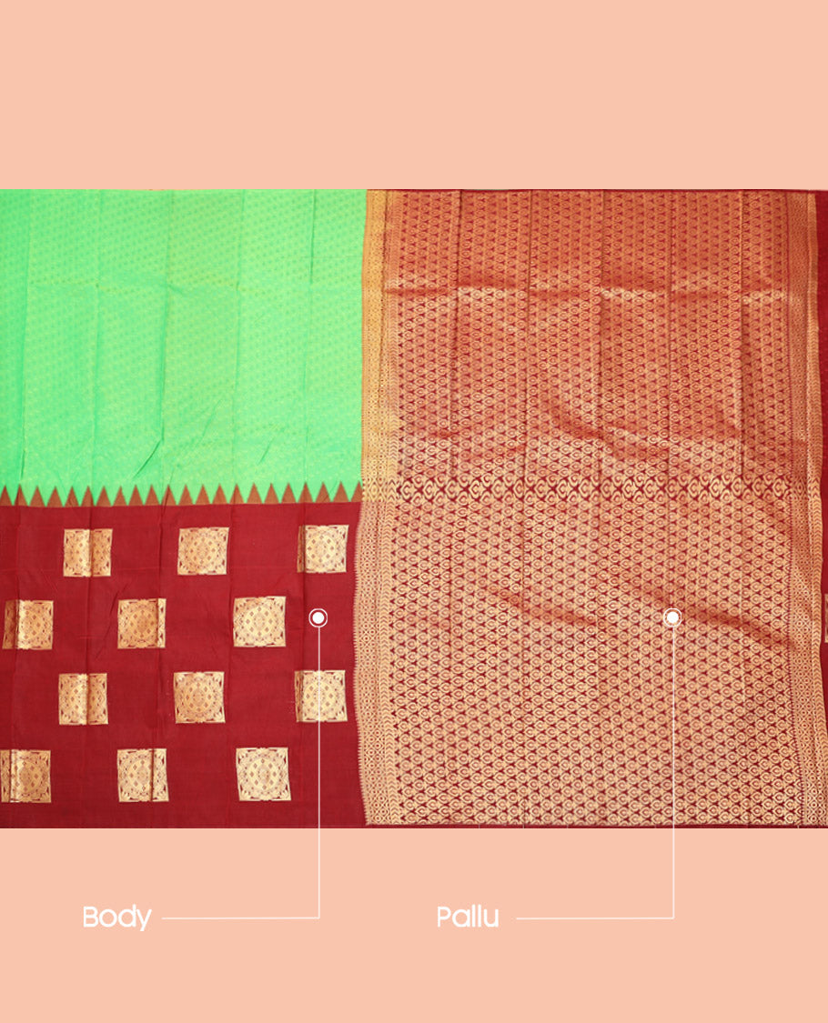 Borderless Red-Green Budget Silk Saree Features Embossed and Zari Buttas, Complemented by a Contrast Intricate Pallu, and a Contrast Blouse
