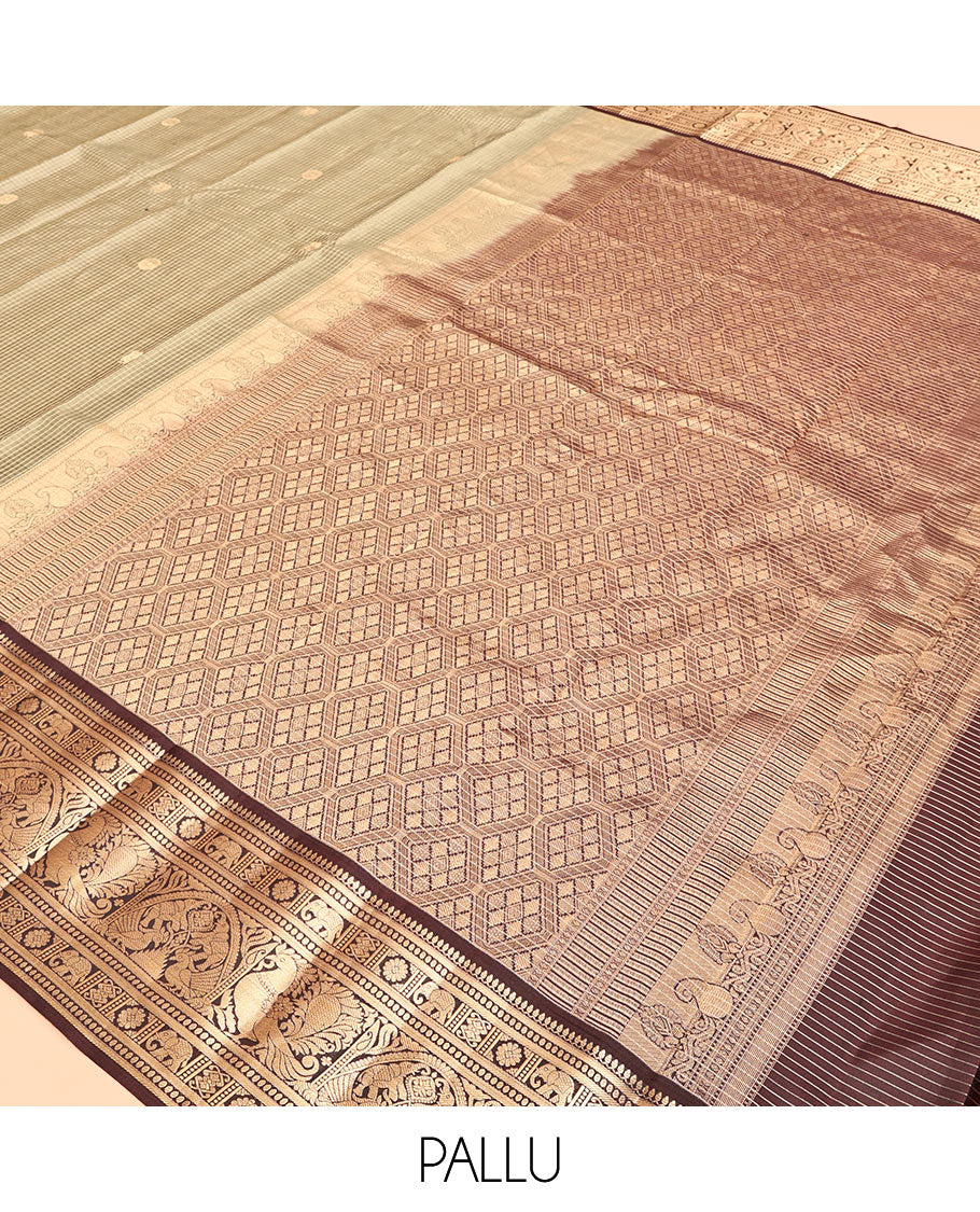 Beige Vasundhara Silk Saree, Meticulously Crafted with Zari Buttas and Checks, a Contrast Border of Thilakam Mokku, Paisa, Kamalam, Yaanai, and Mayil, Jaal Pallu, and a Contrast Blouse