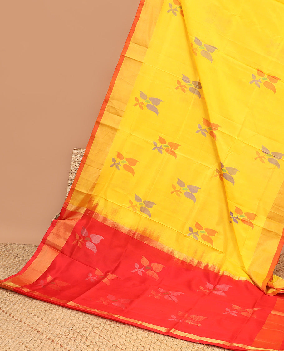 Yellow uppada saree with floral buttas, contrast plain border & pallu of floral designs