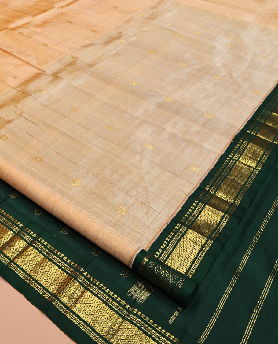 Sandal Kanchipuram Silk Saree, Sparsely Sparkled with Zari Buttas, Contrast One-Sided Korvai Border of Panner Sombu, Banaras, Muthu, and Mayil Kann Designs, Zari Design Pallu, and No Blouse