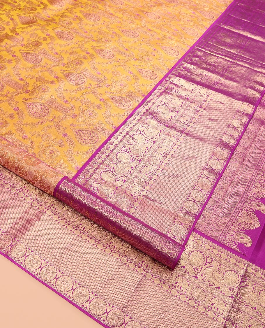 Yellow Kanchipuram Wedding Silk Saree, Embellished with Jacquard Design, a Contrast Border of Thilakam, Rudraksham, Mayil, Yaanai, Chakram, and Mayil Kann, Grand Pallu, and a Contrast Blouse