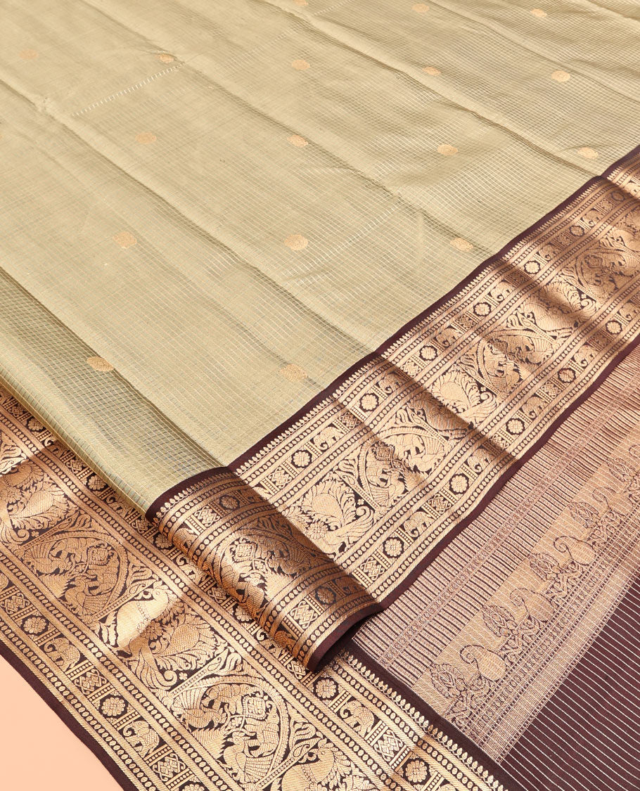 Beige Vasundhara Silk Saree, Meticulously Crafted with Zari Buttas and Checks, a Contrast Border of Thilakam Mokku, Paisa, Kamalam, Yaanai, and Mayil, Jaal Pallu, and a Contrast Blouse