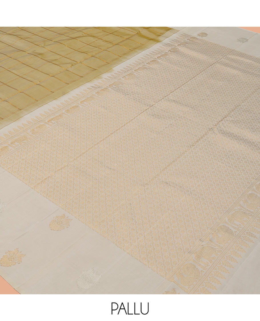 Gold Kanchipuram Silk Saree, Enriched with Zari Checks, a Contrast Zari Border, Grand Jaal Pallu, and a Contrast Blouse