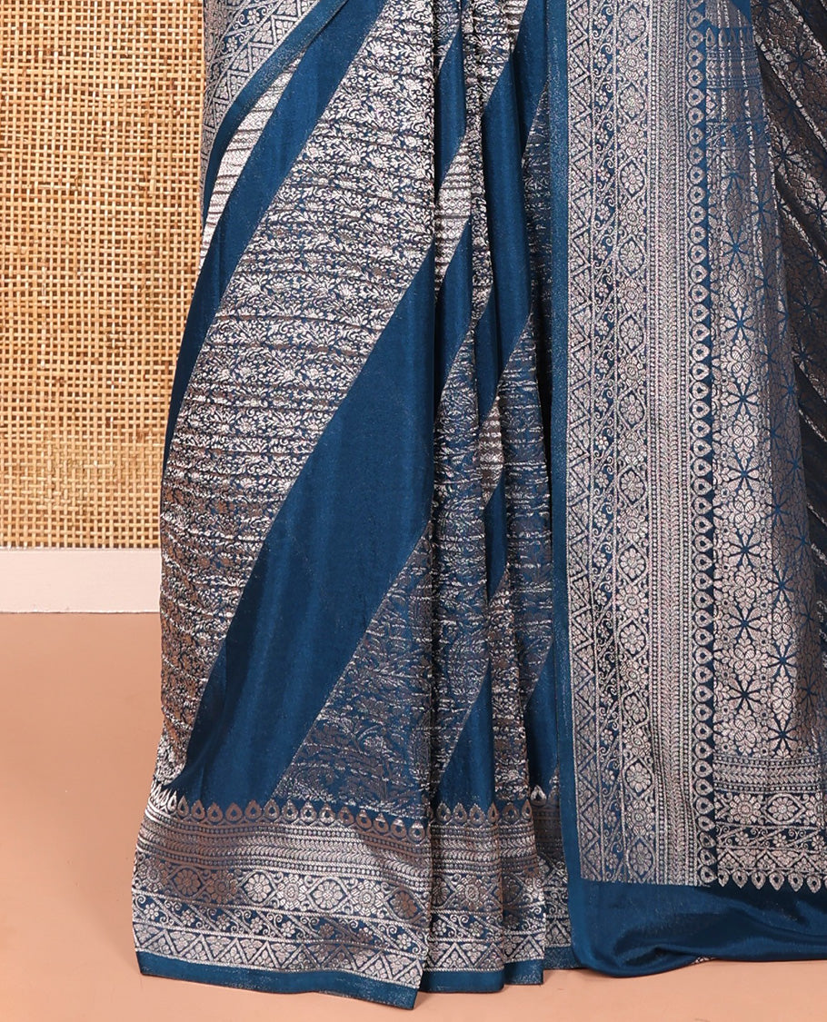 Blue geometric and intricate designs zari woven fancy crepe saree, traditional zari border, floral-star gridded pallu, and a matching blouse