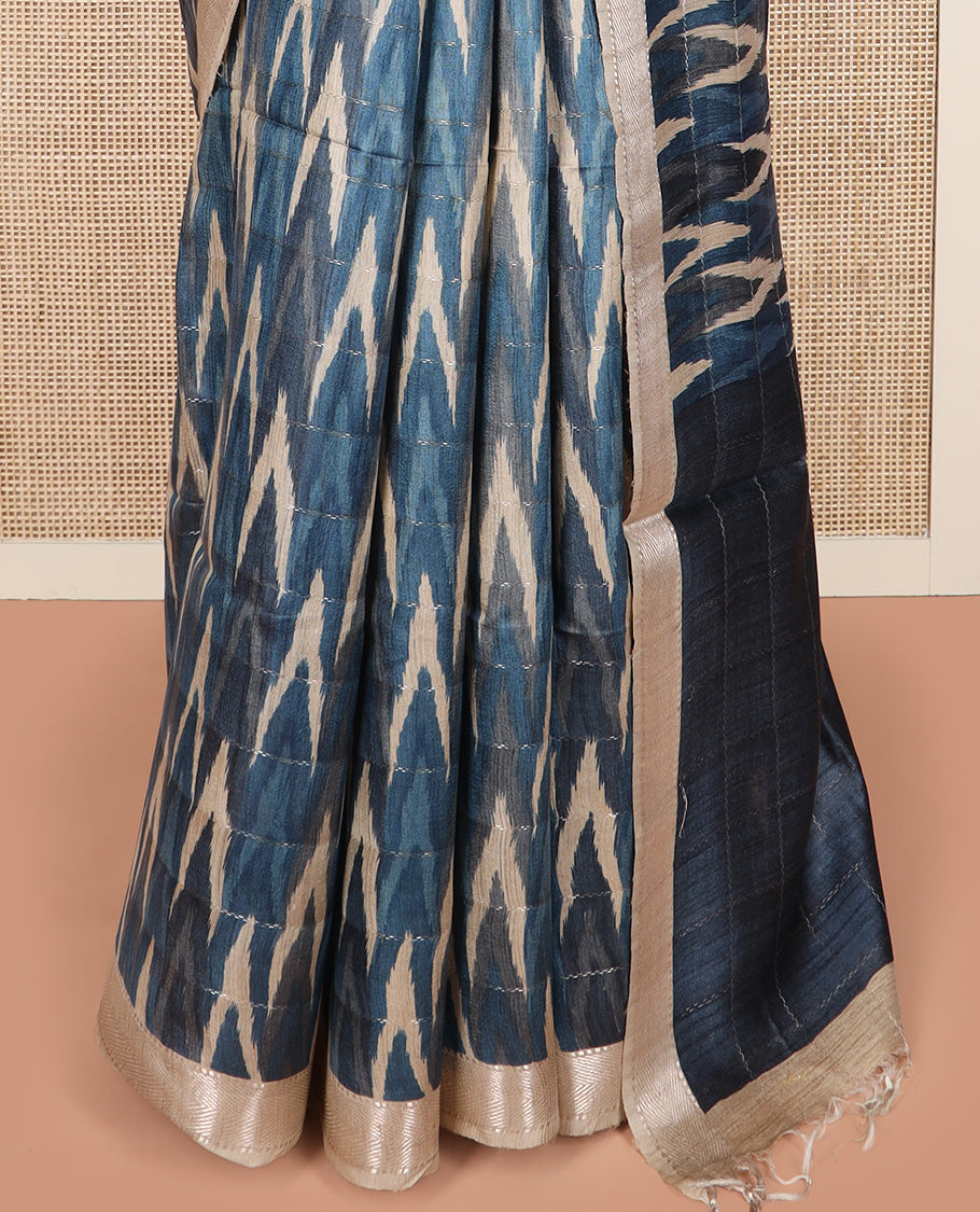 Blue ikkat chevorn design printed tussar silk saree, chevron striped border, and contrast striped pallu