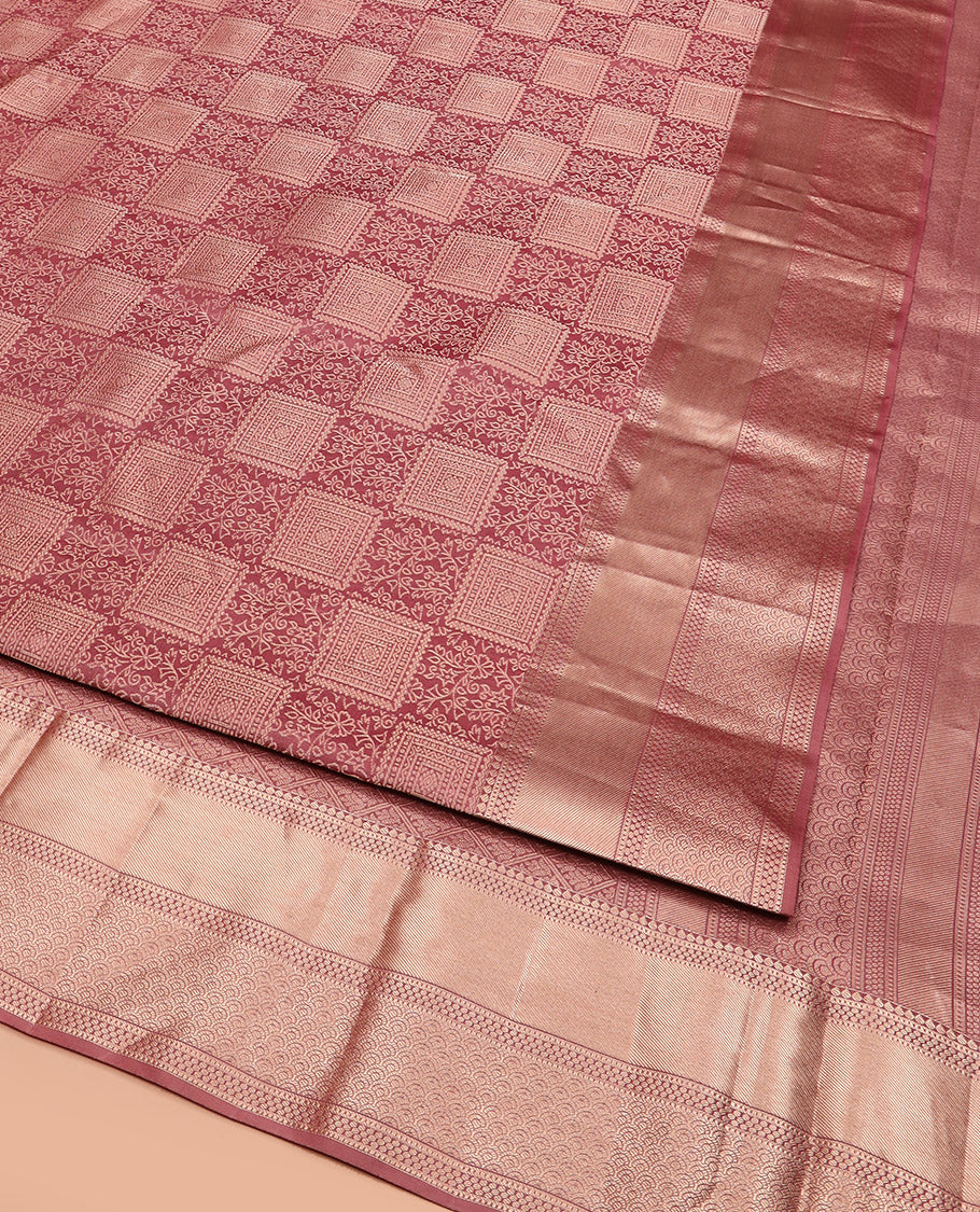 Rosewood Pink Kanchipuram Wedding Silk Saree Elegantly Adorned with Jacquard Designs, Highlighted with Zari Border of Thilakam, Muthu, and Scallop Designs, Majestically Detailed Pallu, and Paired with a Matching Blouse