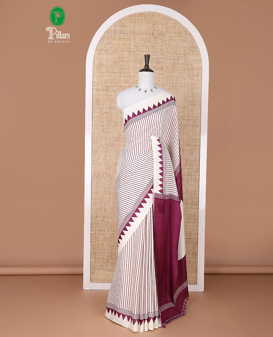 White with purple vertical lining printed design semi modal crepe saree with temple border & circle butta pallu along with printed blouse