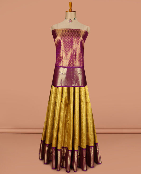 Yellow pure silk half saree, mayil chakram enclosed checked skirt, contrast border of thilakam mokku, muthu, mayil, rudraksham, and mayil kann, jacquard blouse, and zari design dhavani