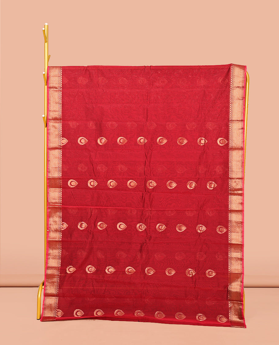 Red Semi-Silk Cotton Saree, Ornamented with Zari Buttas All Over Its Body, Highlighted by a Traditional Zari Border, Intricately Designed Pallu, and Paired with a Contrast Blouse