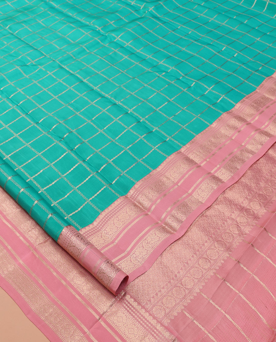 Blue Vasundhara Lite Silk Mix Saree, Embellished with Zari Checks, a Contrast Border of Thilakam, and Chakram Designs, Jaal Pallu, and a Contrast Blouse