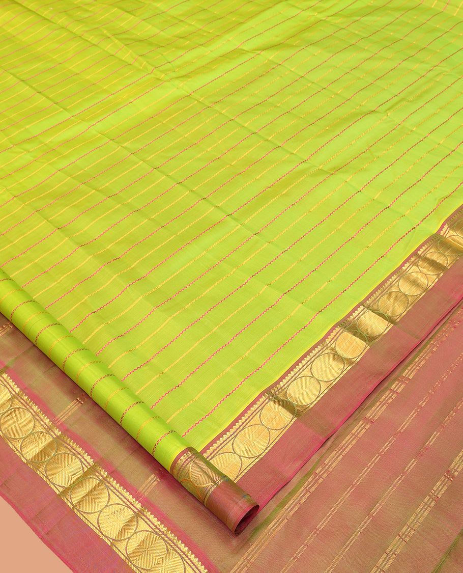 Green Veldhari Striped Kanchipuram Silk Saree, Complemented by a Contrast Kal Eragina Border of Thilakam Mokku, and Rudraskham Design, Pallu of Zari Stripes, and a Contrast Blouse
