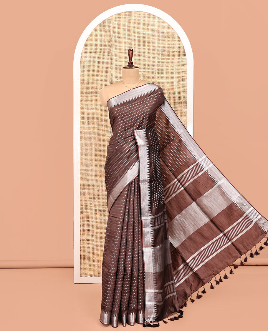 Brown Banana Pith Saree, Richly Detailed with Diamond Buttas All Over Its Body, Subtle Temple Zari Border, Pallu Steeped with Stripes, and Paired with a Matching Blouse