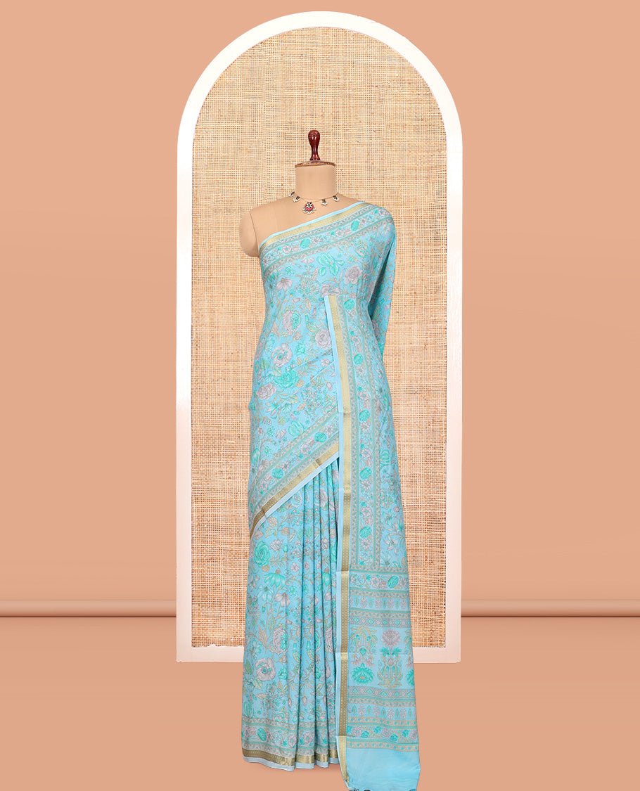Blue Printed Silk Saree, Bedecked with Floral Vine Print, a Traditional Zari Piping Border, Floral Pallu, and a Matching Blouse