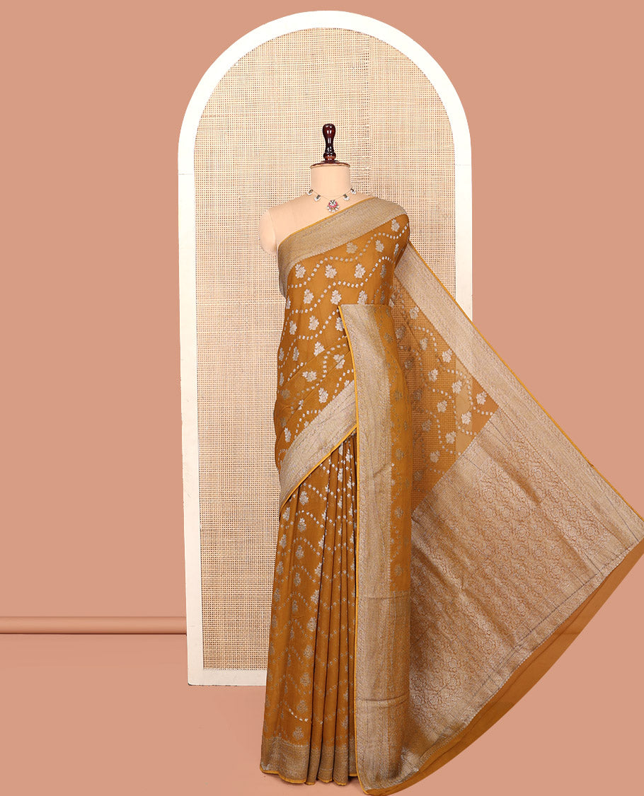 Mustard Georgette Saree, Adorned with Buttas and Stripes, Highlighted by a Traditional Border, Intricately Designed Pallu, and a Matching Blouse