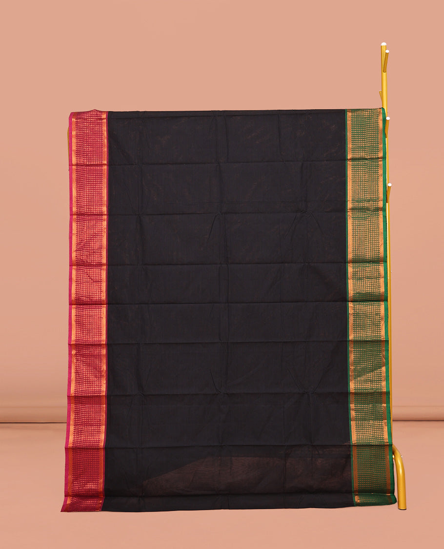 Black Plain Chettinad Cotton Saree, Complemented by Contrast Traditional Zari Design Ganga-Jamuna Border, Pallu of Stripes, and Paired with a Matching Blouse