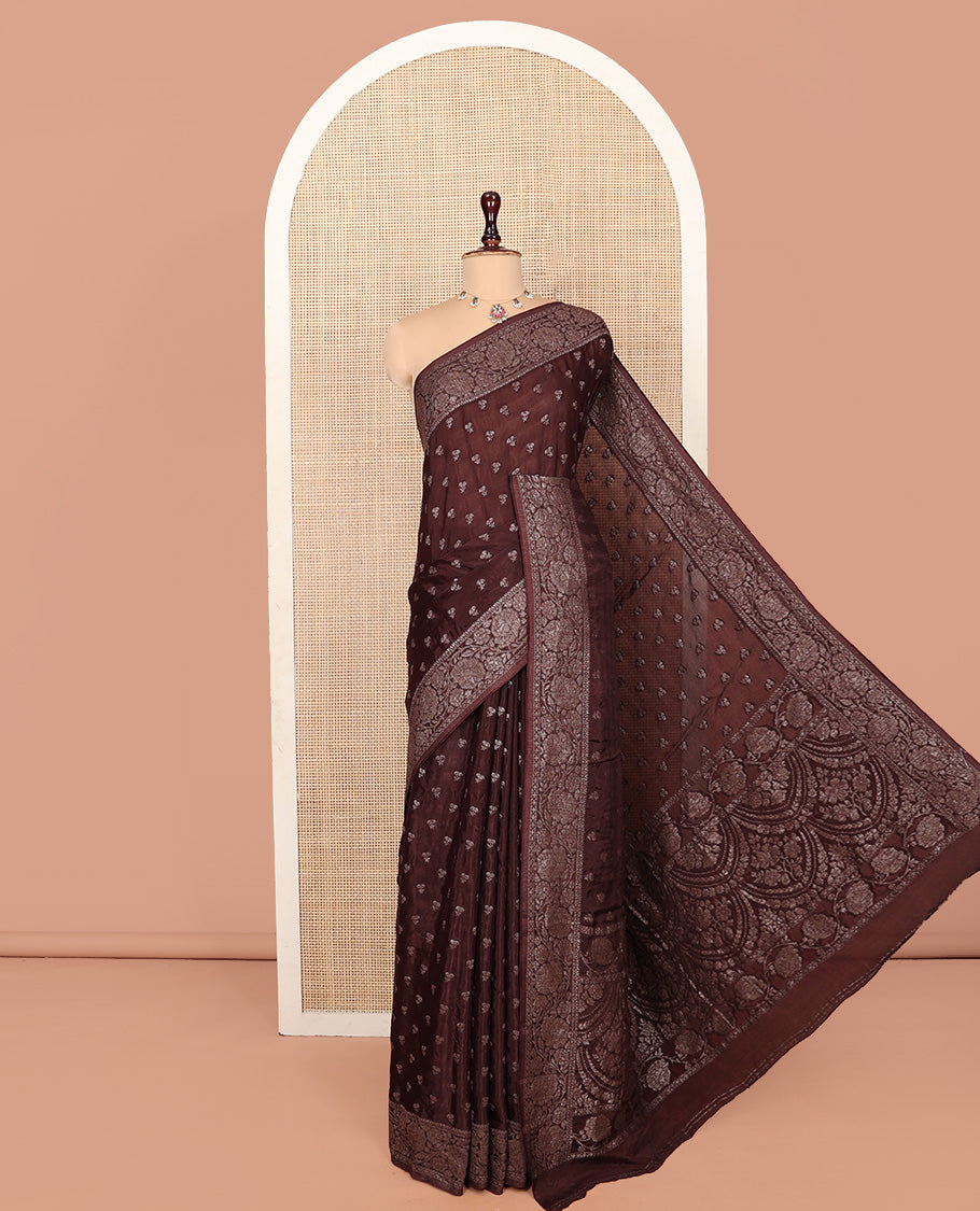 Brown Fancy Crepe Saree, Subtly Sparkled with Buttas, Highlighted by a Floral Creeper Border, Intricate Pallu, and a Matching Blouse