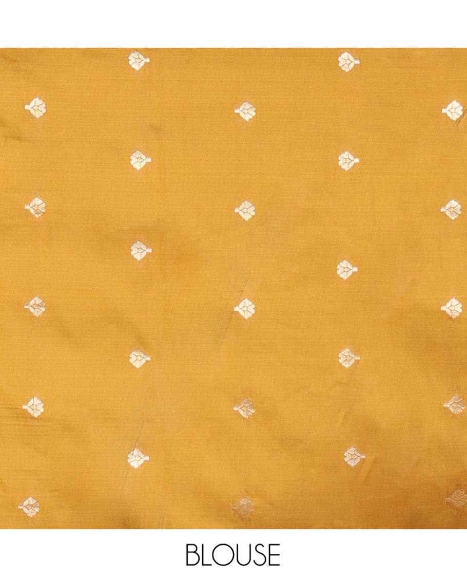 Mustard Plain Semi-Soft Silk Saree, Enriched with Traditional Zari Designs Woven Border, Grandly Woven Pallu Steeped with Chakram Designs, and Paired with a Matching Blouse