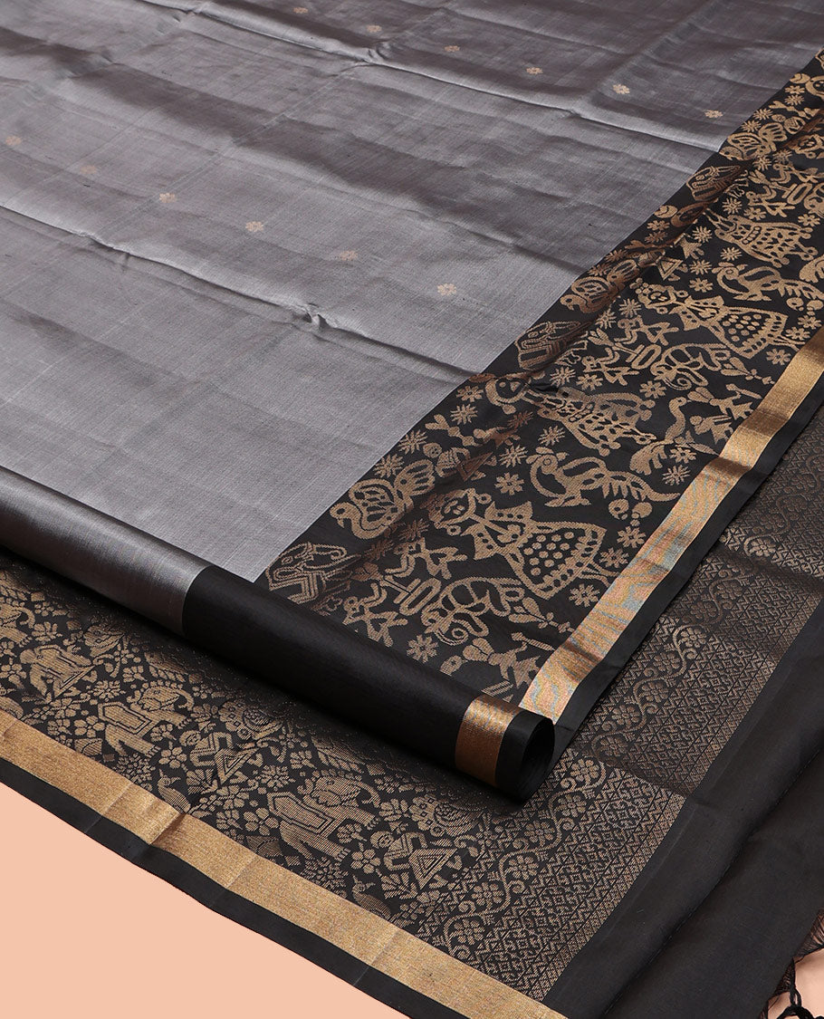 Grey Mayuri Soft Silk Saree, Subtly Sparkled with Zari Buttas, a Contrast Tribal-Themed Woven Border, Pallu of Forest-Themed Designs, and Contrast Blouse