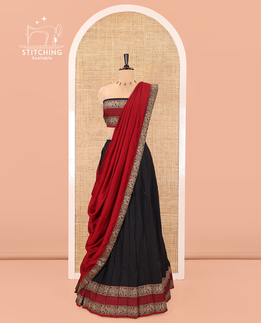 Black-Red Mercerised Cotton Half-Saree Features Plain with Contrast Rettai Pettu Elephant-Chakram Bordered Skirt, Paired with a Matching Blouse, and Comes with a Contrast Elephant-Chakram-Bordered Dhavani