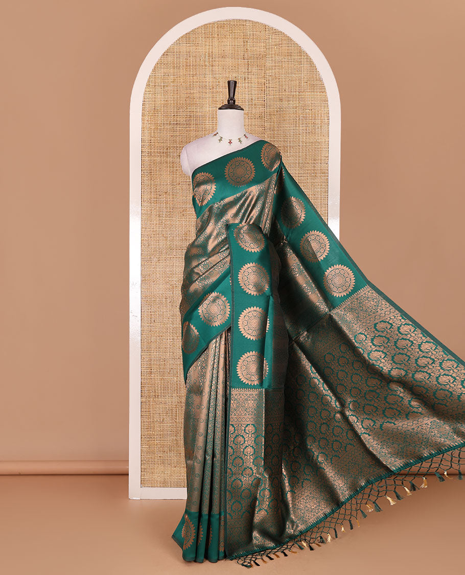 Green jacquard kanchi tissue saree, zari chakram motifs border, intricately zari woven pallu, and a matching zari design blouse