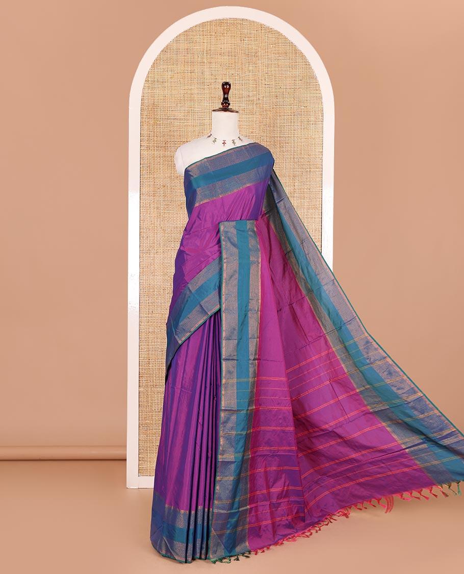 Violet plain semi-soft silk saree, contrast zari striped border, striped pallu, and matching blouse