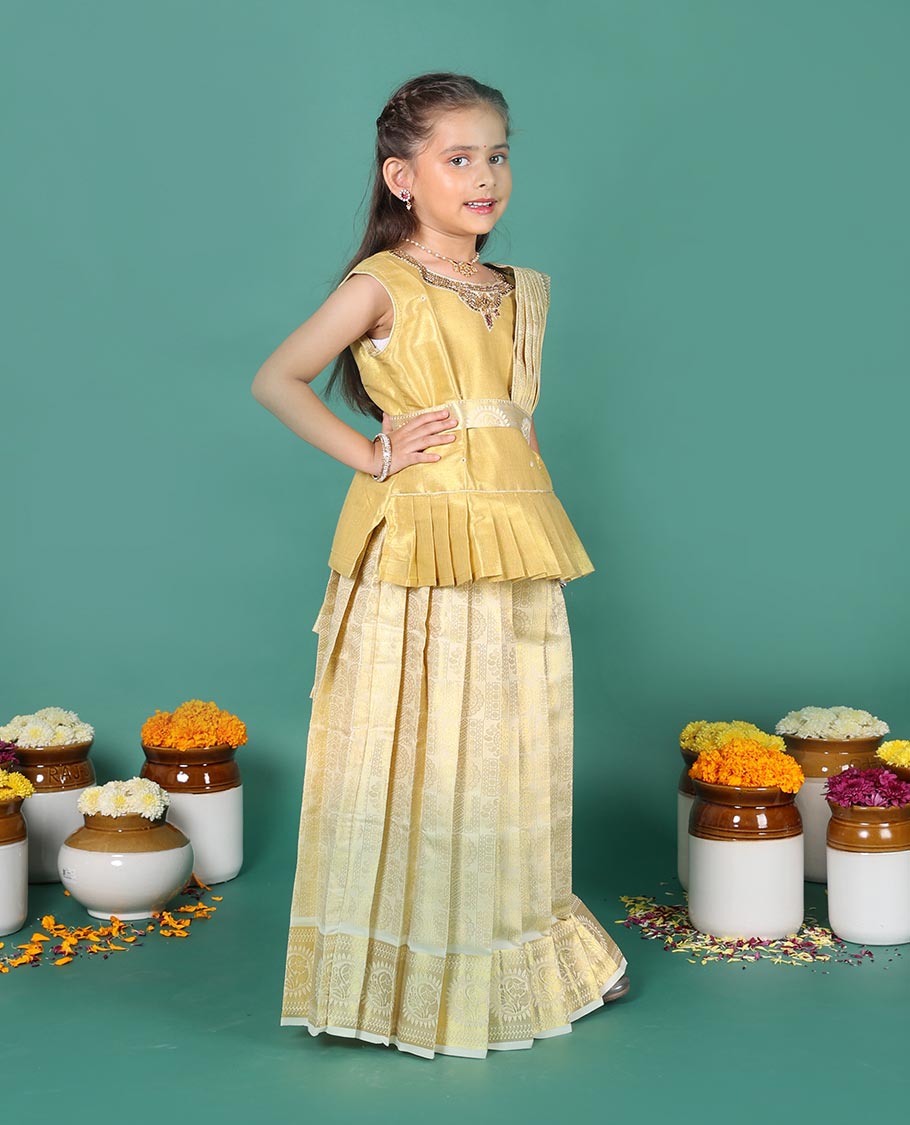Cream art silk pavadai readymade set, golden zari chakram jacquard with traditional zari border skirt, embroidered sleeveless blouse, and detachable dupatta