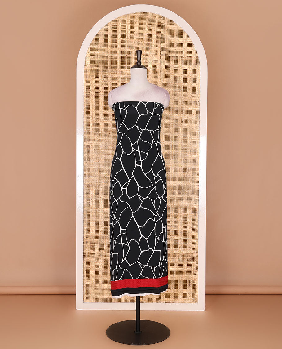 Black and white Italian crepe material churidar set, geometric printed top, plain bottom, and dupatta of floral and geometric print