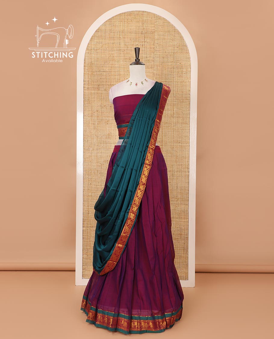 Violet mercedised cotton half-saree, plain contrast elephant zari border skirt, matching blouse & contrast green zari elephant border dhavani