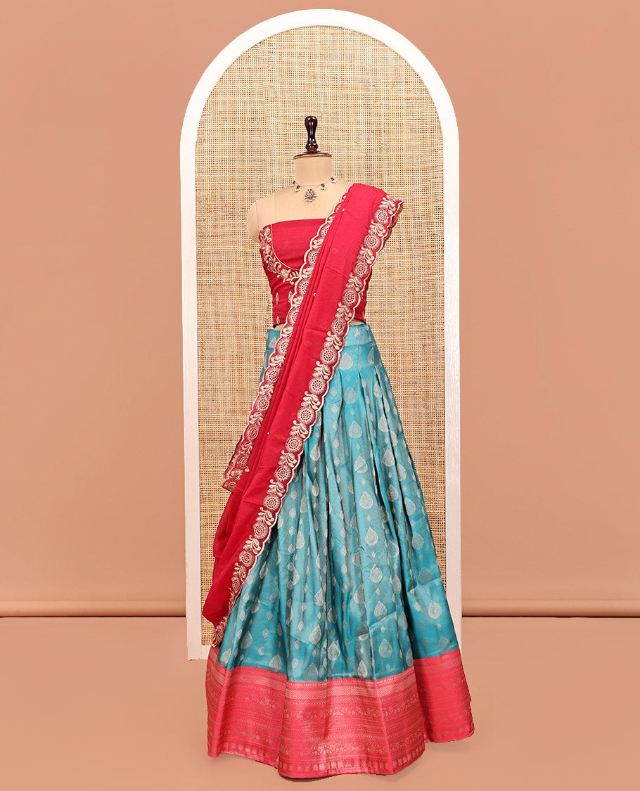 Blue Art Silk Half Saree Features Buttas Woven Skirt, Contrast Traditional Border, an Embroidered Blouse, and Contrast Scallop Embroidered Dhavani