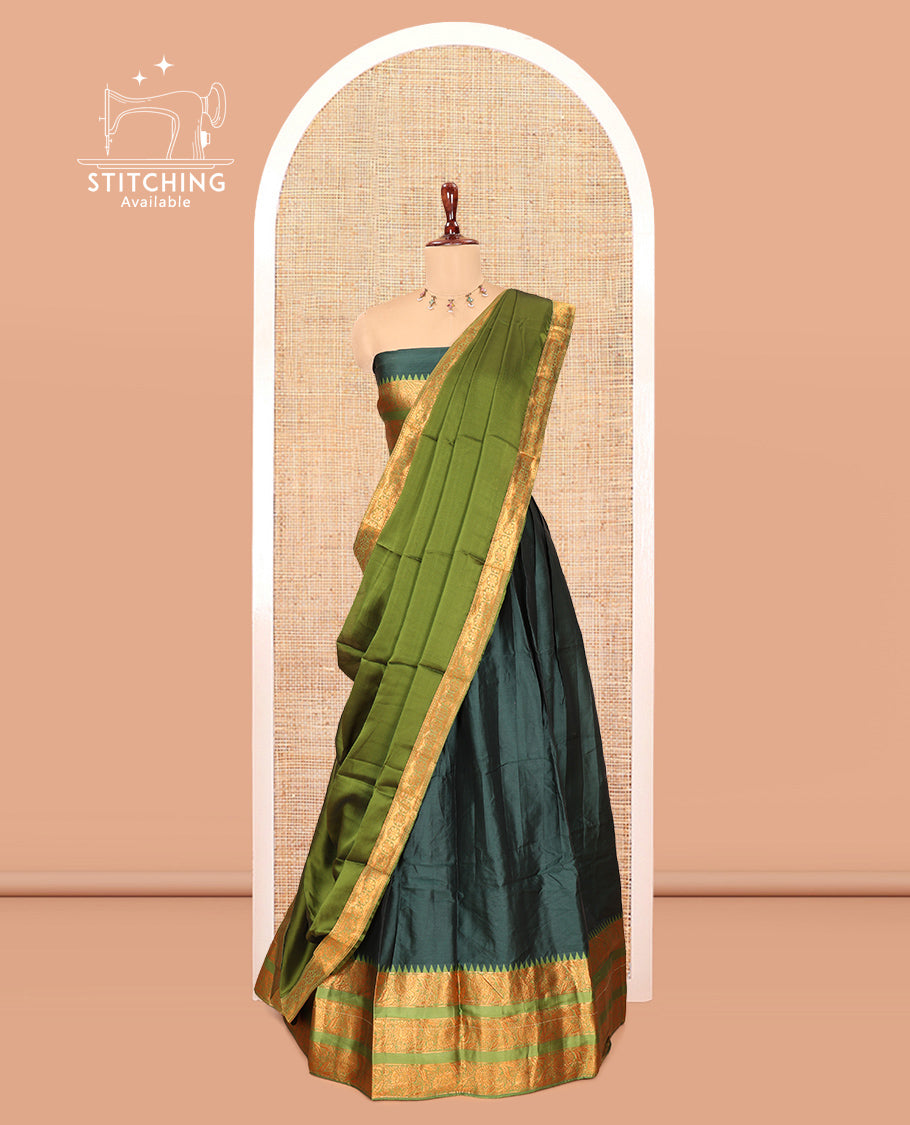 Bottle Green Semi-Banarasi Half-Saree Features Plain Skirt, Contrast Floral Creeper Zari Border, Matching Blouse, Contrast Dhavani