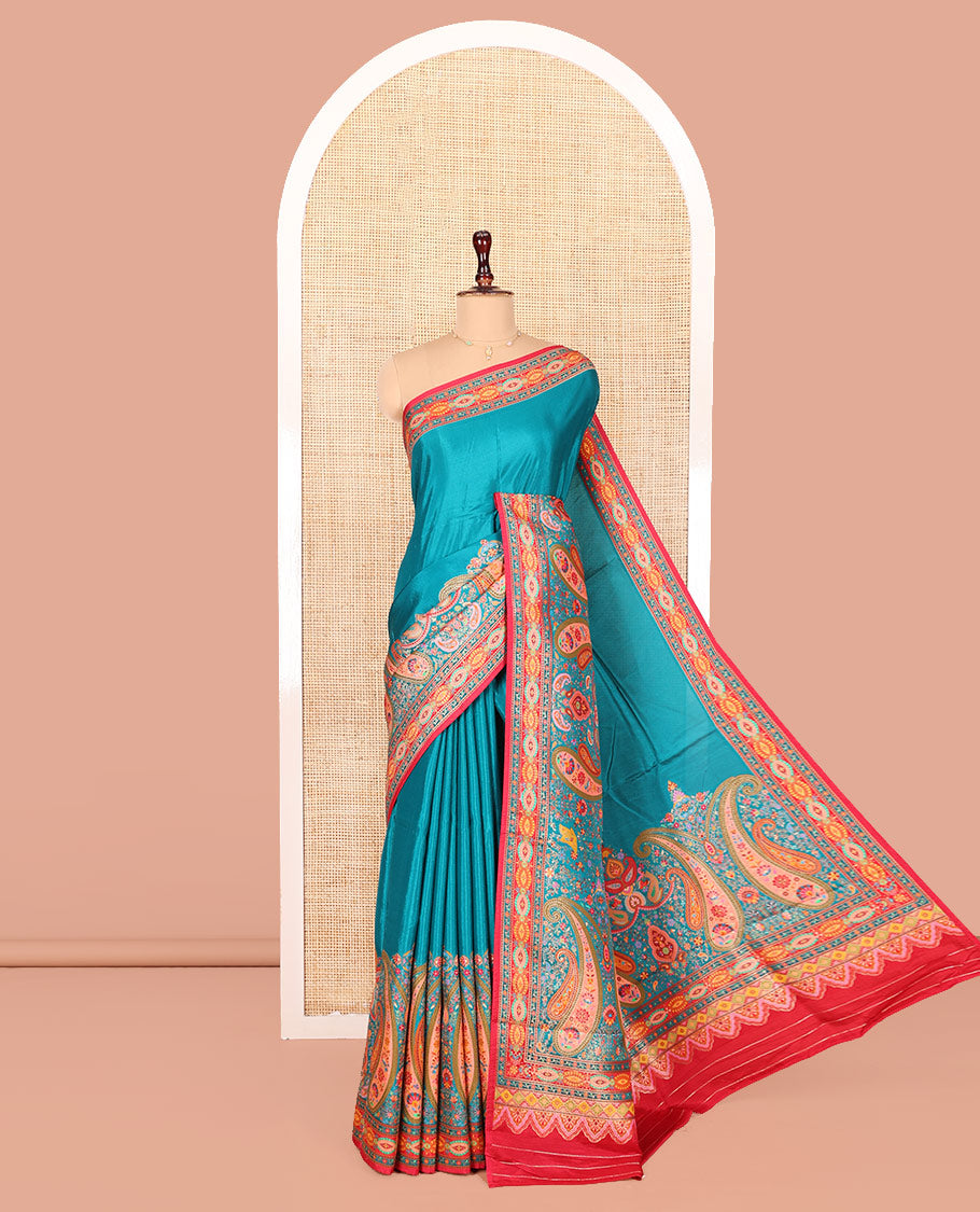 Blue Dola Silk Saree, Finely Crafted with Colorful Paisley Motifs Printed on Its Body, Complemented by Contrast-Printed Border, Pallu of Paisley Print, and Paired with a Contrast Blouse