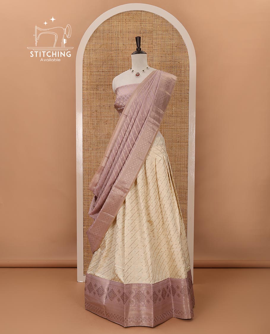 Cream semi-banaras material chudidar,leheriya zari skirt,contrast lavender zari & swarovski stonework border,jacquard blouse & zari weave dhavani