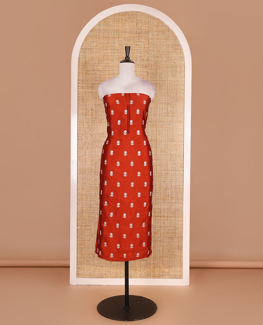 Rust Vichitra silk material churidar set, floral motifs embroidered top, contrast Santoon bottom, and floral vine thread embroidered scallop dupatta