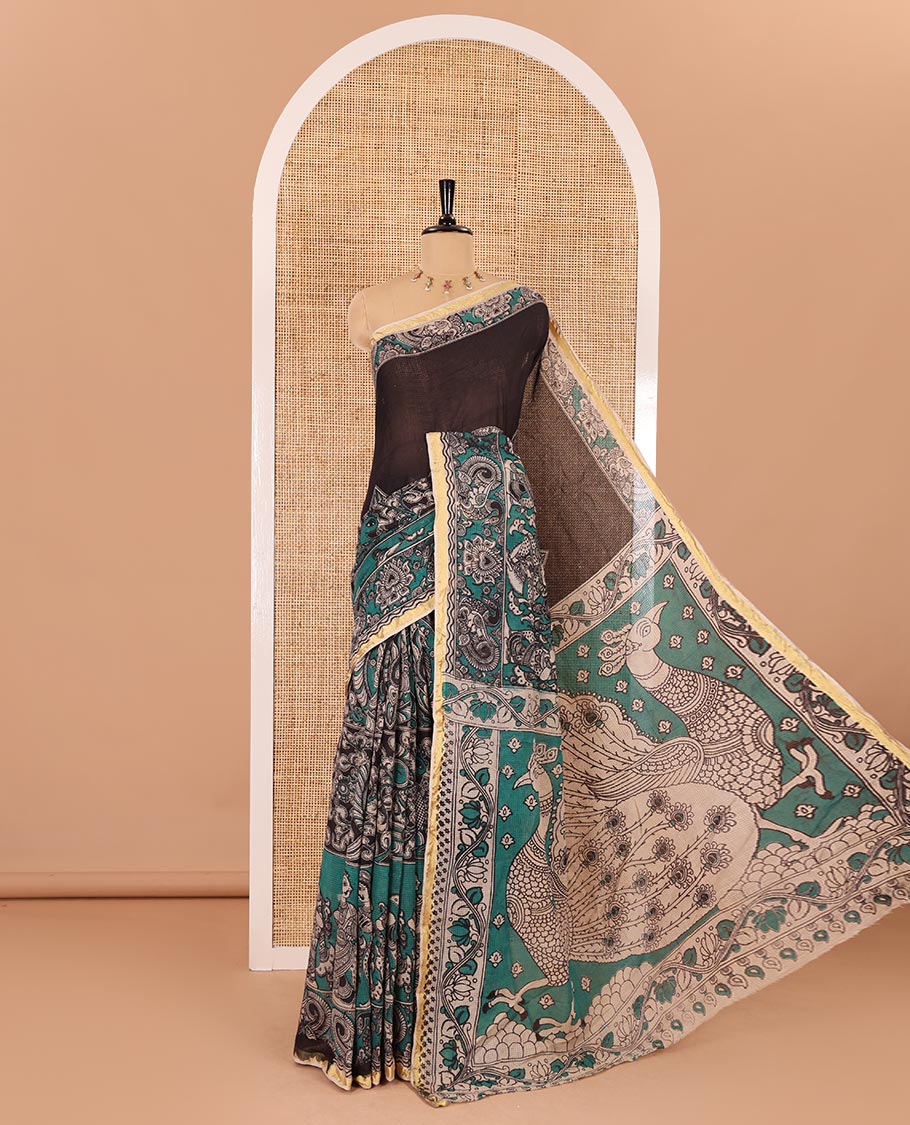 Green kalamkari floral, peacock, and human figurines printed Kota cotton saree, contrast printed border, peacock printed pallu, and a contrast floral printed blouse