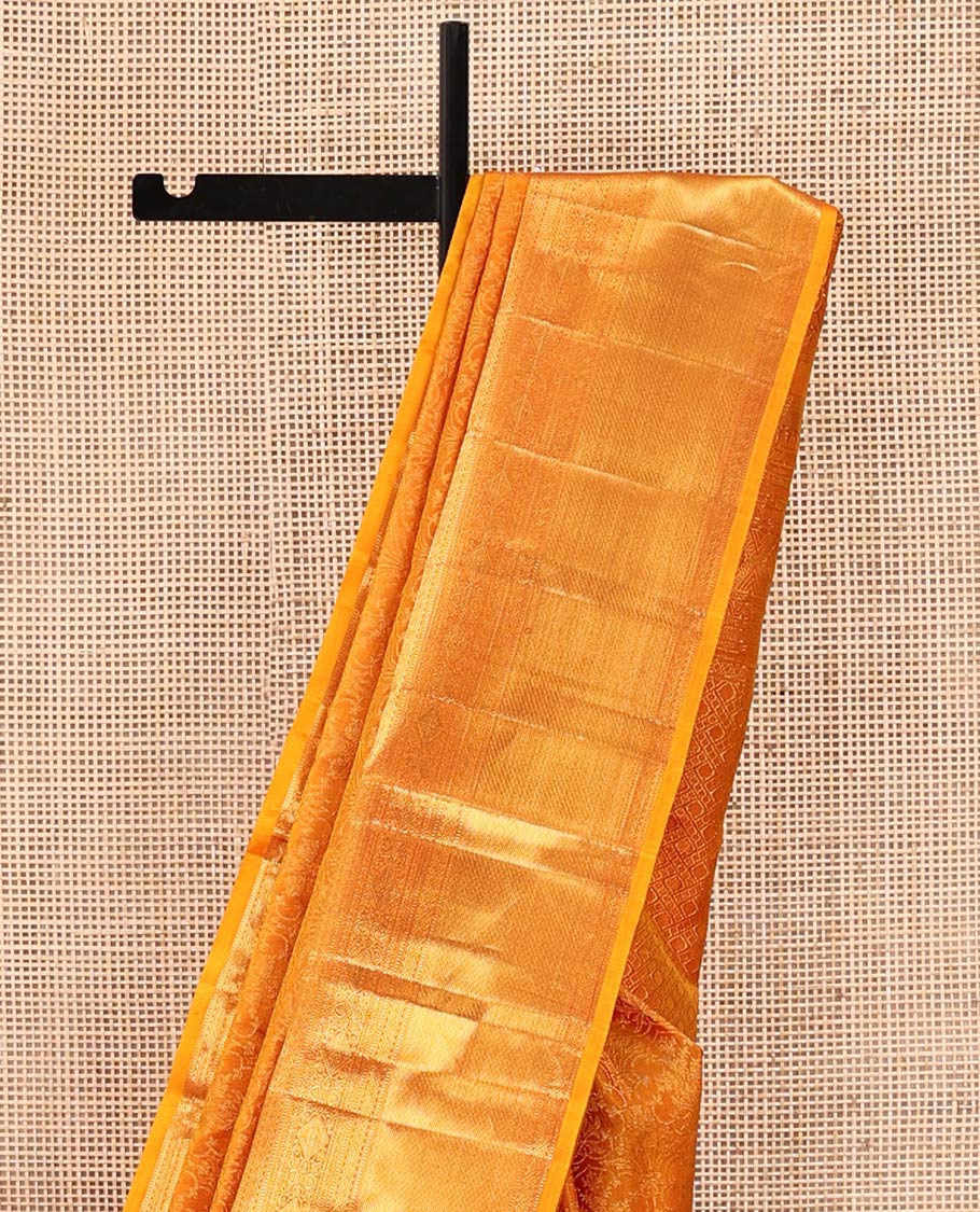 Rust Kanchipuram Wedding Silk Saree, Subtly Sparkled With Jacquard Design On Its Body, Highlighted by Zari Border of Thilakam Mokku, Diamond, and Muthu Designs, Grand Pallu and Paired with a Matching Blouse