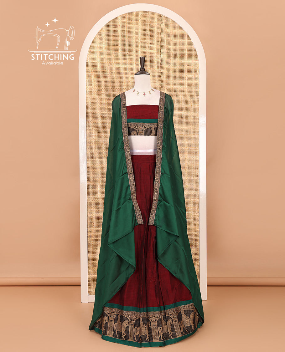 Maroon with green mercedised cotton half-saree, contrast elephant zari border skirt, matching blouse & one side border georgette dhavani